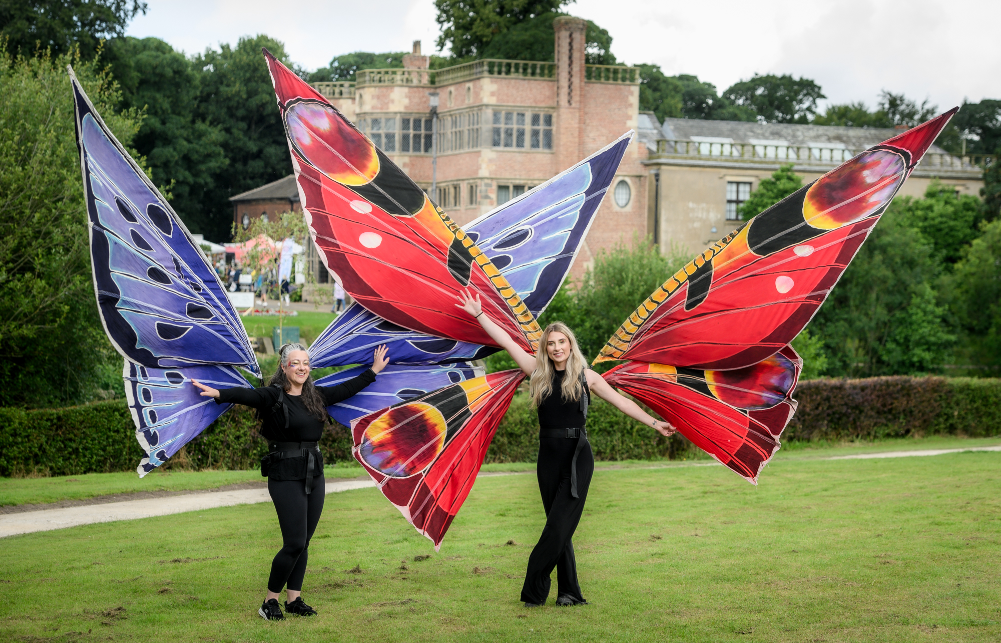 Children wearing butterfly wings